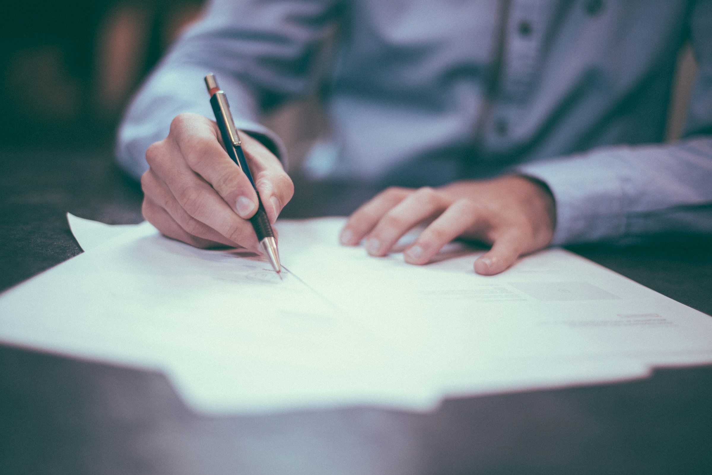 A businessman making notes